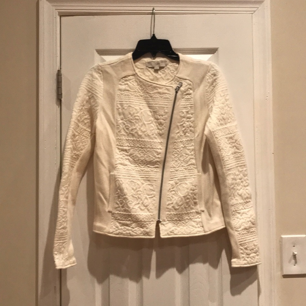 White jacket with embossing detail